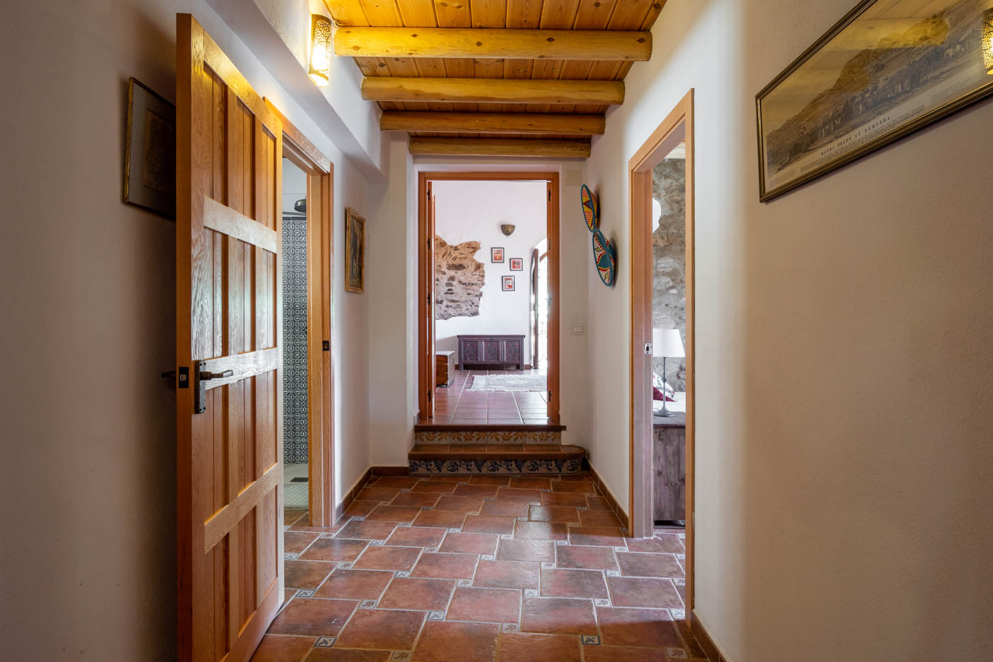 Hallway from living room leds to two bedrooms